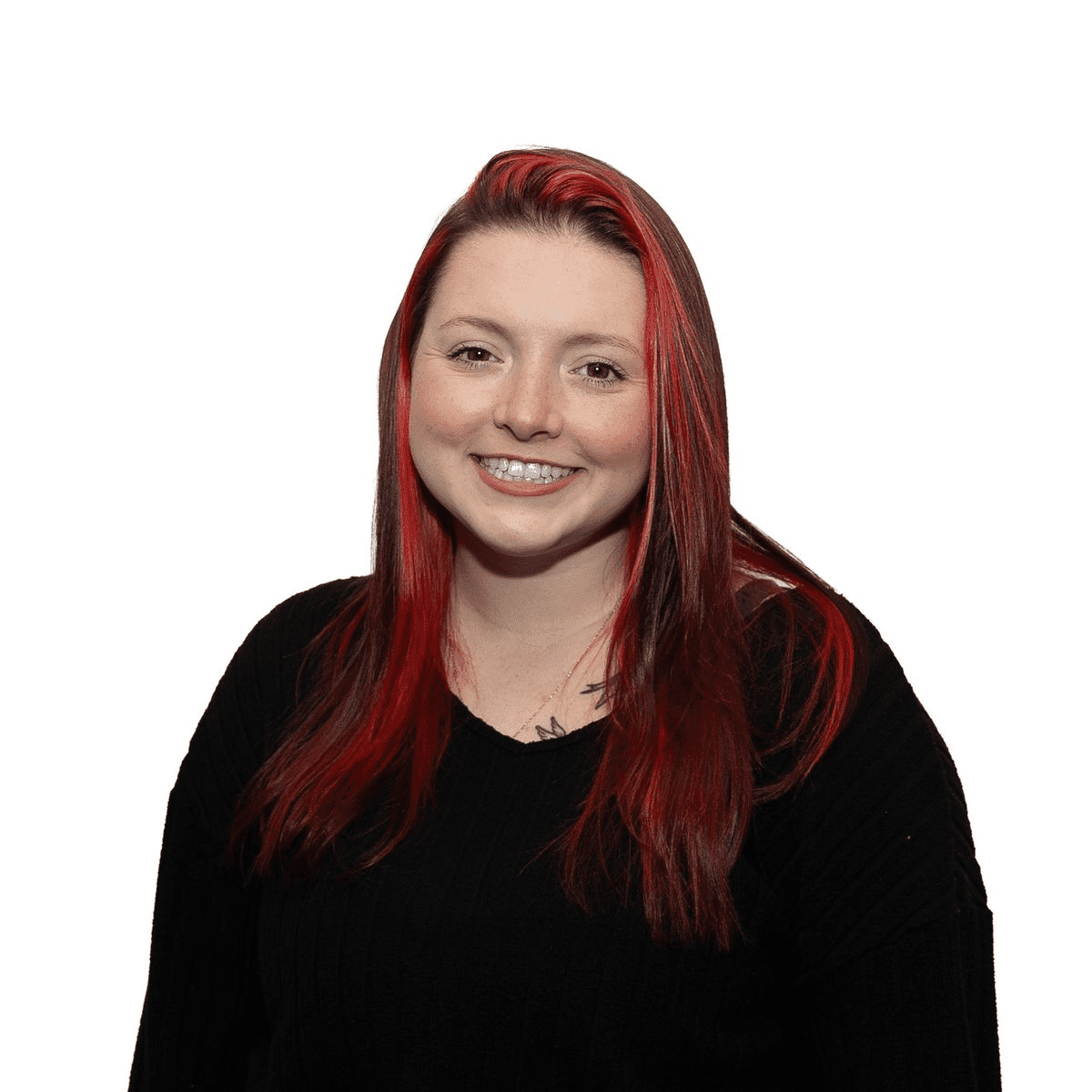 Portrait of Shae O., a professional stylist at The Fixx Hair Studio, showcasing their expertise and style.