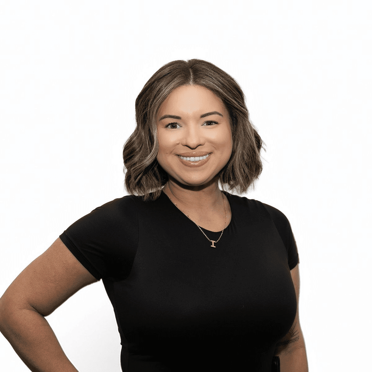 Portrait of Beca G., a professional stylist at The Fixx Hair Studio, showcasing their expertise and style.