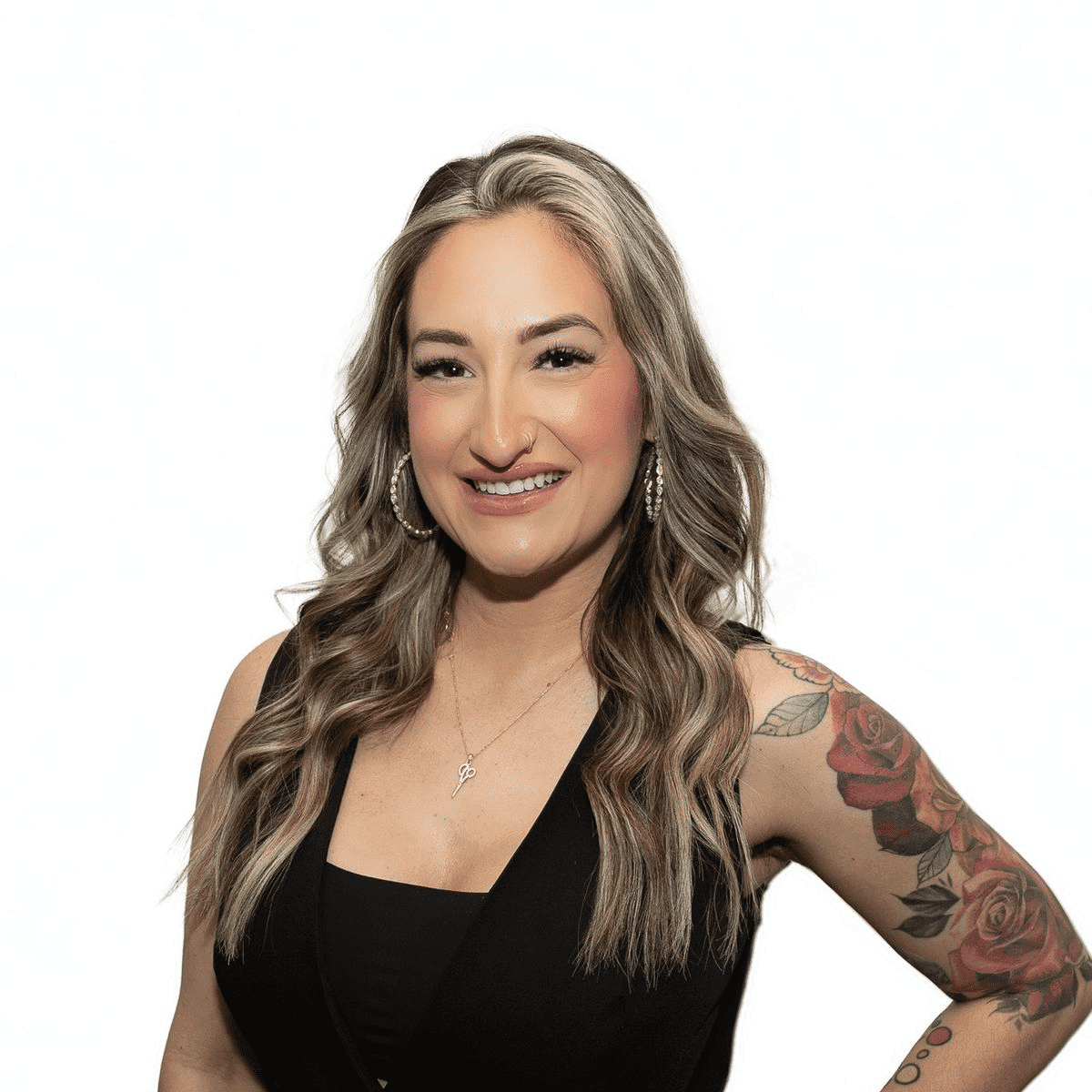 Portrait of Kara Jean C., a professional stylist at The Fixx Hair Studio, showcasing their expertise and style.