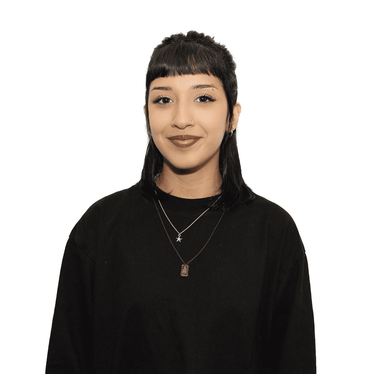 Portrait of Keyla J., a professional stylist at The Fixx Hair Studio, showcasing their expertise and style.