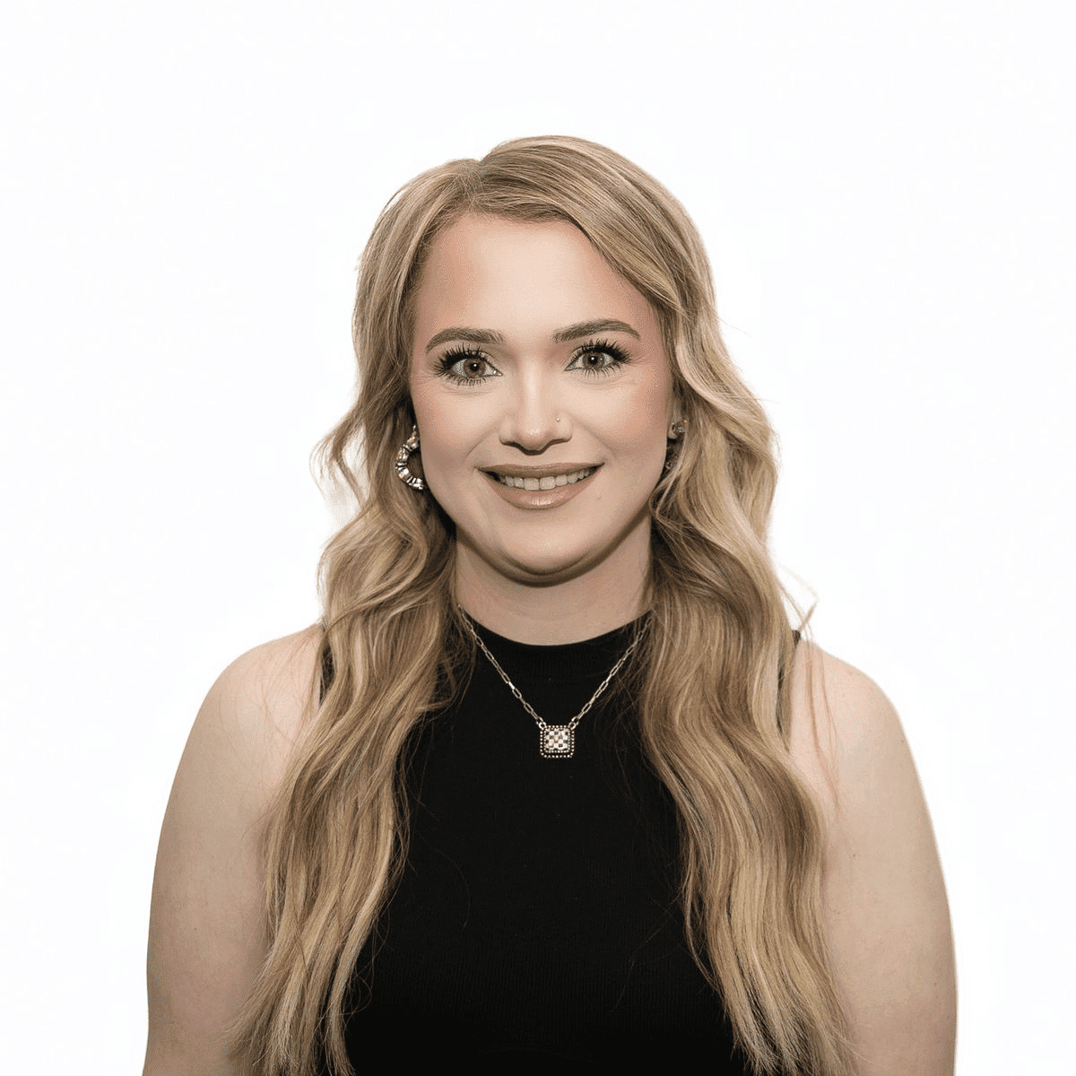Portrait of Michaela Y., a professional stylist at The Fixx Hair Studio, showcasing their expertise and style.