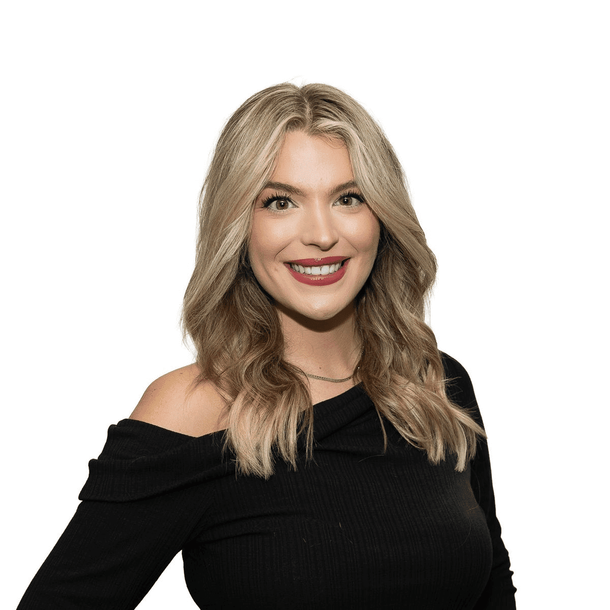 Portrait of Alli N., a professional stylist at The Fixx Hair Studio, showcasing their expertise and style.