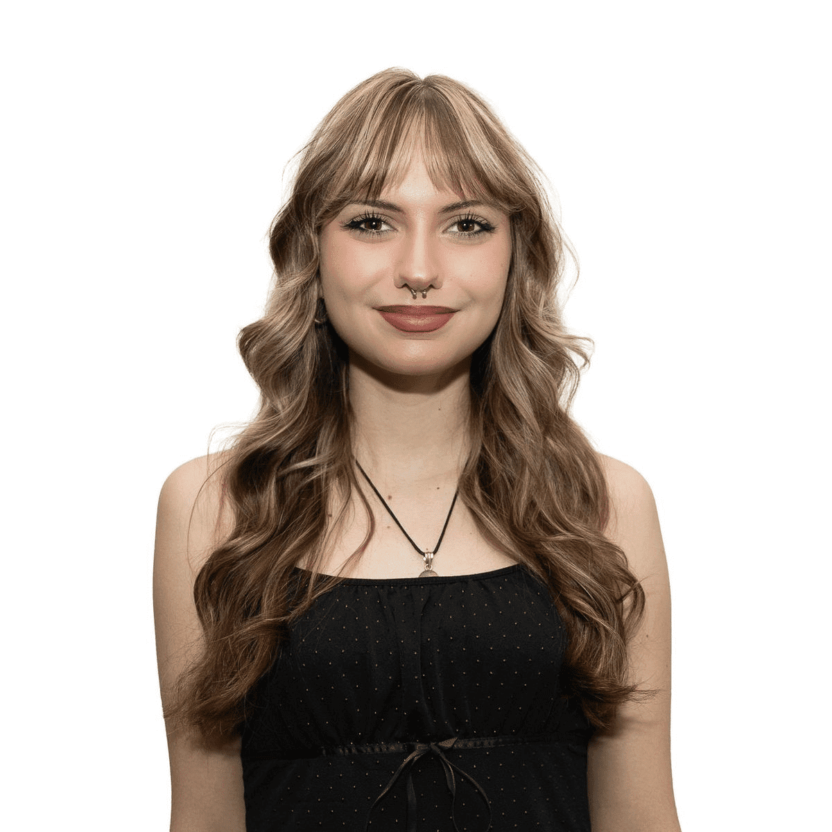 Portrait of Mirabel V., a professional stylist at The Fixx Hair Studio, showcasing their expertise and style.